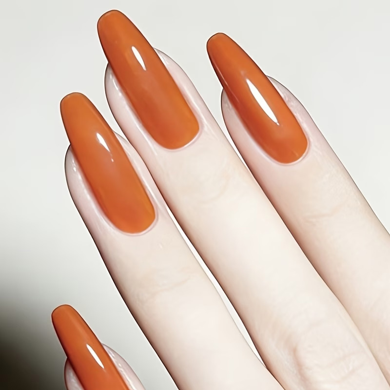 زيت تقوية الأظافر بلون الكرامي - مراجعة Nail Art Orange وسعره