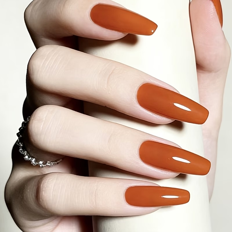 زيت تقوية الأظافر بلون الكرامي - مراجعة Nail Art Orange وسعره